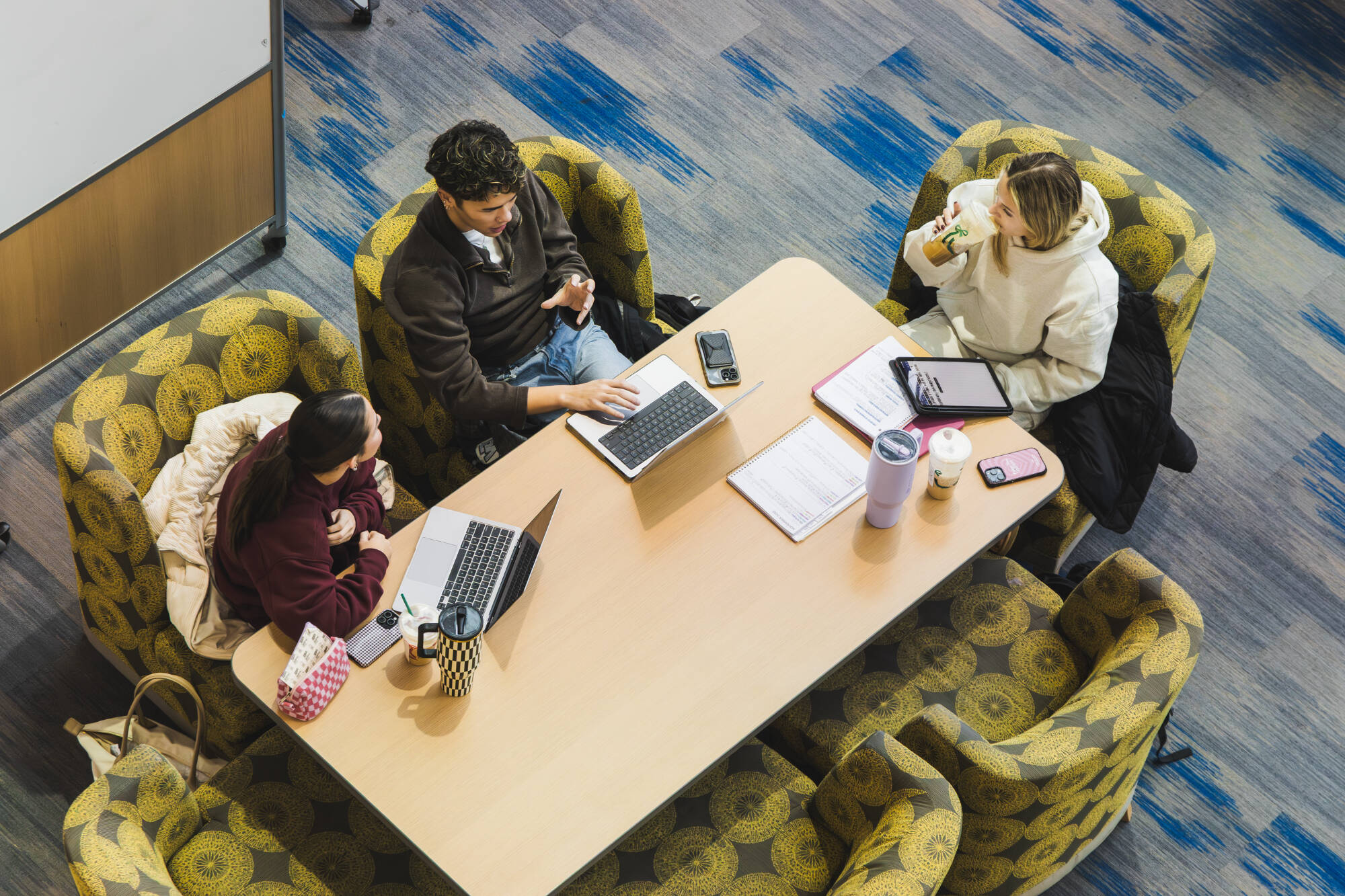 Students studying at a table